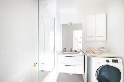 Cuisine ou kitchenette dans l'établissement Appartement T2 neuf - Grande Terrasse de 25m2