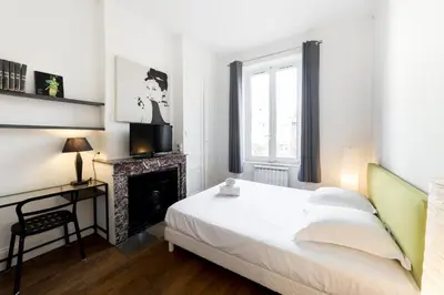 Un ou plusieurs lits dans un hébergement de l'établissement All in Lyon | Charme quartier Montchat