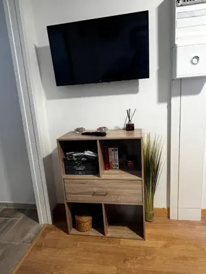 Télévision ou salle de divertissement dans l'établissement Les gîtes de la bergerie