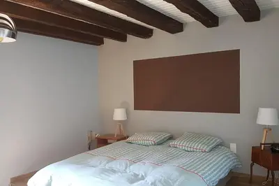 Un ou plusieurs lits dans un hébergement de l'établissement Charmante maison au calme pour 6 personnes