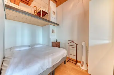 Un ou plusieurs lits dans un hébergement de l'établissement GuestReady - Canut Typique avec vue sur Lyon