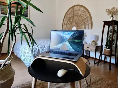 Télévision ou salle de divertissement dans l'établissement Studio cosy Chez Ré
