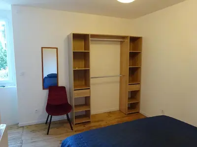 Un ou plusieurs lits dans un hébergement de l'établissement Gîte 10 personnes maison entière