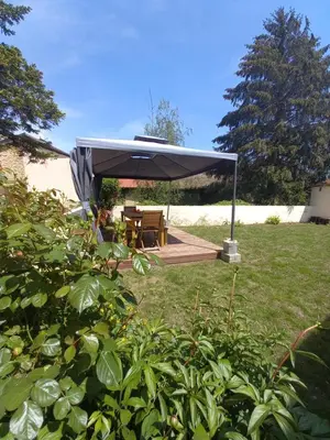 Jardin de l'établissement Gîte 10 personnes maison entière