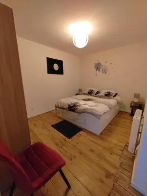 Un ou plusieurs lits dans un hébergement de l'établissement Gîte 10 personnes maison entière