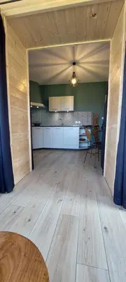 Cuisine ou kitchenette dans l'établissement Le Cocon Beaujolais