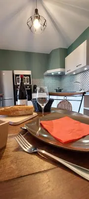 Cuisine ou kitchenette dans l'établissement Le Cocon Beaujolais