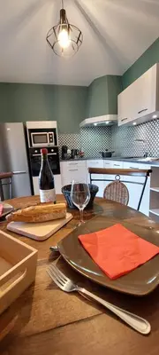 Cuisine ou kitchenette dans l'établissement Le Cocon Beaujolais