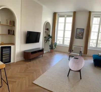 Télévision ou salle de divertissement dans l'établissement Appartement de beau standing