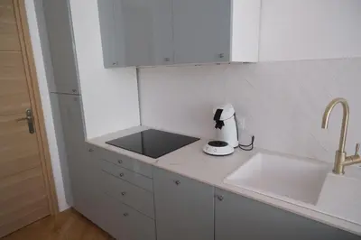 Cuisine ou kitchenette dans l'établissement Appartement de beau standing