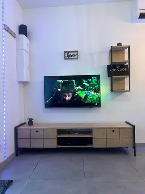 Télévision ou salle de divertissement dans l'établissement Magnifique T2 Meyzieu neuf charme et élégance