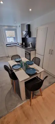 Cuisine ou kitchenette dans l'établissement L'Appart Oytier Saint Oblas+Parking gratuit