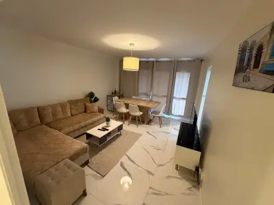 Coin salon dans l'établissement Bel Appartement spacieux T4 avec 2 Parkings privée Gratuit