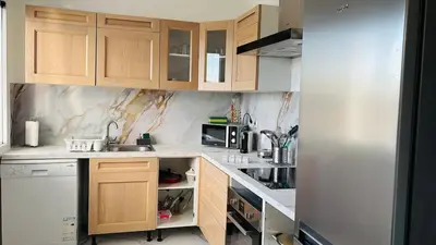 Cuisine ou kitchenette dans l'établissement Bel Appartement spacieux T4 avec 2 Parkings privée Gratuit