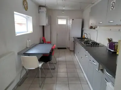 Cuisine ou kitchenette dans l'établissement Comme à la maison !