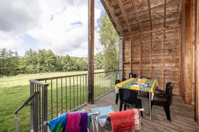 Balcon ou terrasse dans l'établissement Camping Le Lac des Sapins