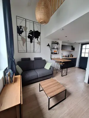 Coin salon dans l'établissement Logement indépendant 