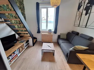 Coin salon dans l'établissement Logement indépendant 
