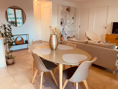 Coin salon dans l'établissement Appartement T3 Confluence