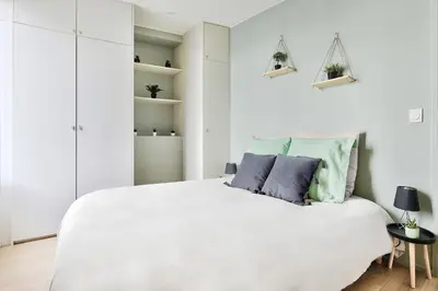 Un ou plusieurs lits dans un hébergement de l'établissement Appartement Le Somptueux - Idéalement Situé