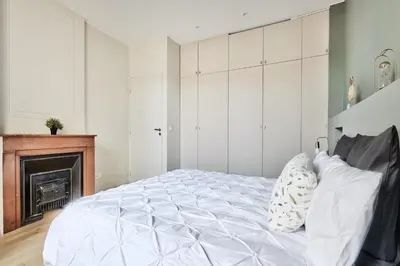 Un ou plusieurs lits dans un hébergement de l'établissement Appartement Le Somptueux - Idéalement Situé