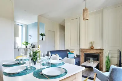 Coin salon dans l'établissement Appartement Le Somptueux - Idéalement Situé