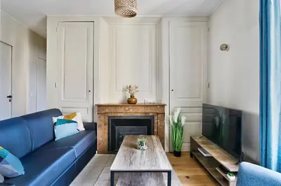Coin salon dans l'établissement Appartement Le Somptueux - Idéalement Situé