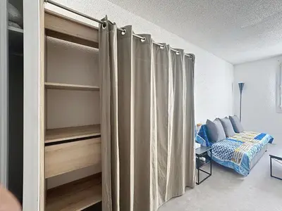 Un ou plusieurs lits dans un hébergement de l'établissement Studio meublé à Lyon Centre