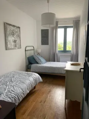 Un ou plusieurs lits dans un hébergement de l'établissement Maison sur cour
