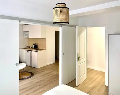 Cuisine ou kitchenette dans l'établissement Charmant appartement au cœur de Neuville - Lyon à 20mn