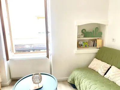 Coin salon dans l'établissement Charmant appartement au cœur de Neuville - Lyon à 20mn