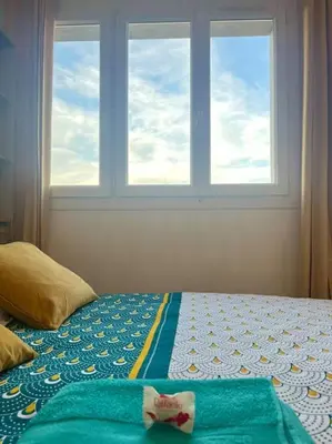 Un ou plusieurs lits dans un hébergement de l'établissement Chambre privée dans un appartement partagé