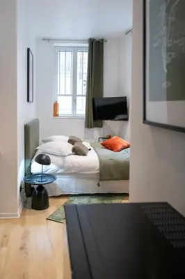 Un ou plusieurs lits dans un hébergement de l'établissement La Suite Opéra 1 - Hypercentre proche place des Terreaux