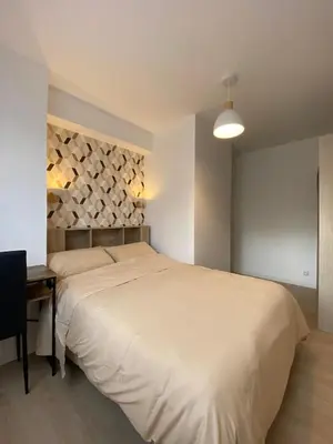 Un ou plusieurs lits dans un hébergement de l'établissement Sleep In La Mulatière