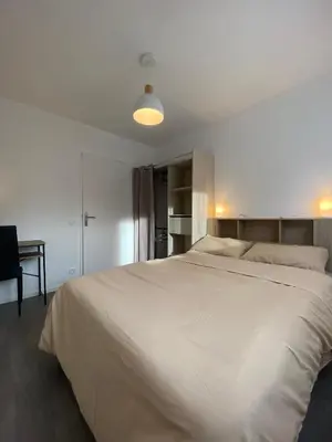 Un ou plusieurs lits dans un hébergement de l'établissement Sleep In La Mulatière