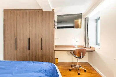 Un ou plusieurs lits dans un hébergement de l'établissement Cocoon du vieux Lyon - Luxury apartment - Balneo