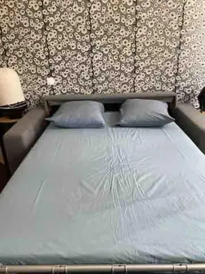 Un ou plusieurs lits dans un hébergement de l'établissement STUDIO BELLECOUR Republique