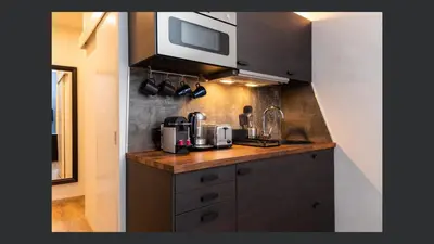 Cuisine ou kitchenette dans l'établissement Standing Bellecour Perrache