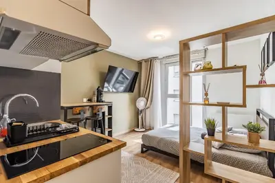 Cuisine ou kitchenette dans l'établissement Studio Charpennes - Parking privé gratuit