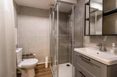 Salle de bains dans l'établissement Studio Charpennes - Parking privé gratuit