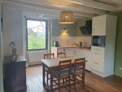 Cuisine ou kitchenette dans l'établissement Douceurs des vignes du Vivian
