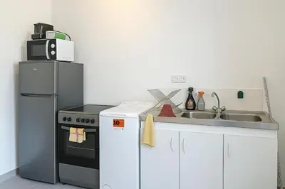 Cuisine ou kitchenette dans l'établissement Proche Hôpital LyonSud Metro B Calme et WiFi